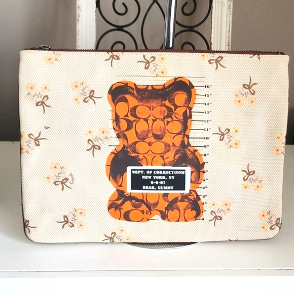 Coach Handbags - Coach Vandal Gummy Bear Beige Floral Pouch Clutch with Orange Bear Design